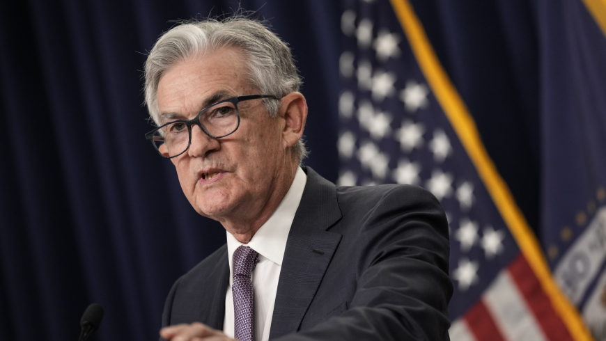 Powell warns US rates will peak at higher level than expected