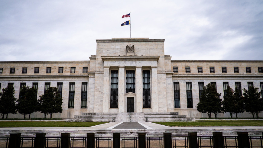 Fed leaves rates unchanged, signals another hike this year