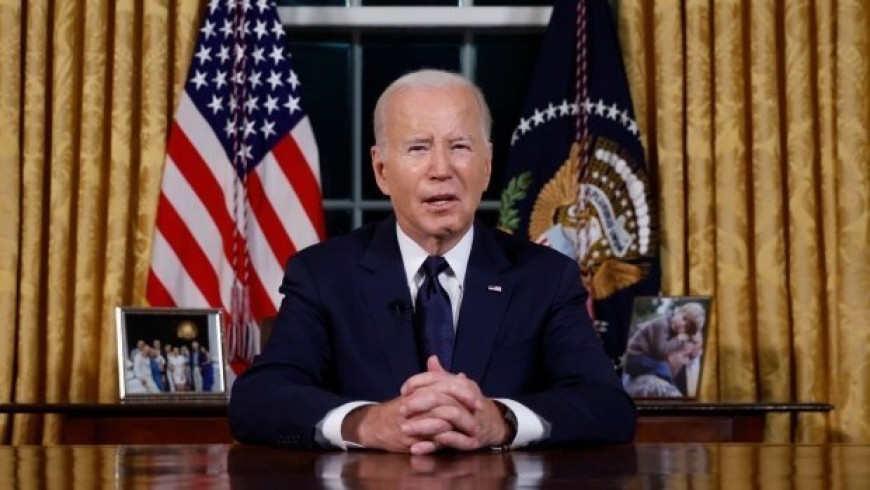 Biden casts Russia, Hamas as parallel threats to democracy